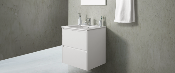 Mueble de baño moderno con lavabo integrado y cajones de almacenamiento en color blanco.
